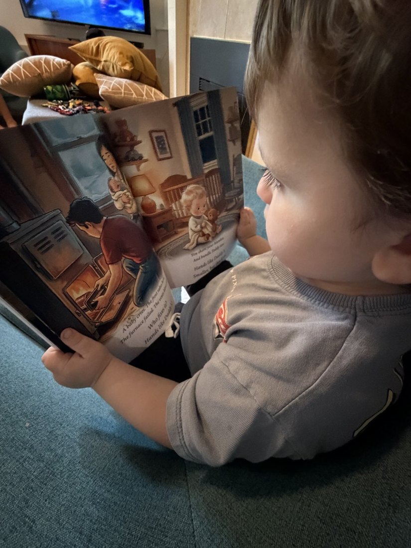 A little boy turning to the furnace page